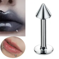 Spike formunda gümüş dudak, tragus, kıkırdak piercing modelinin kullanım görünümü