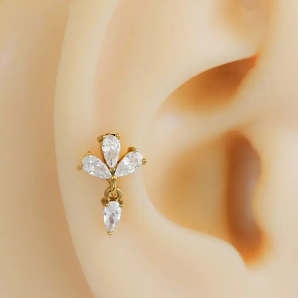 gold-zirkon-tasli-isik-damlasi-tragus-helix-kikirdak-piercing