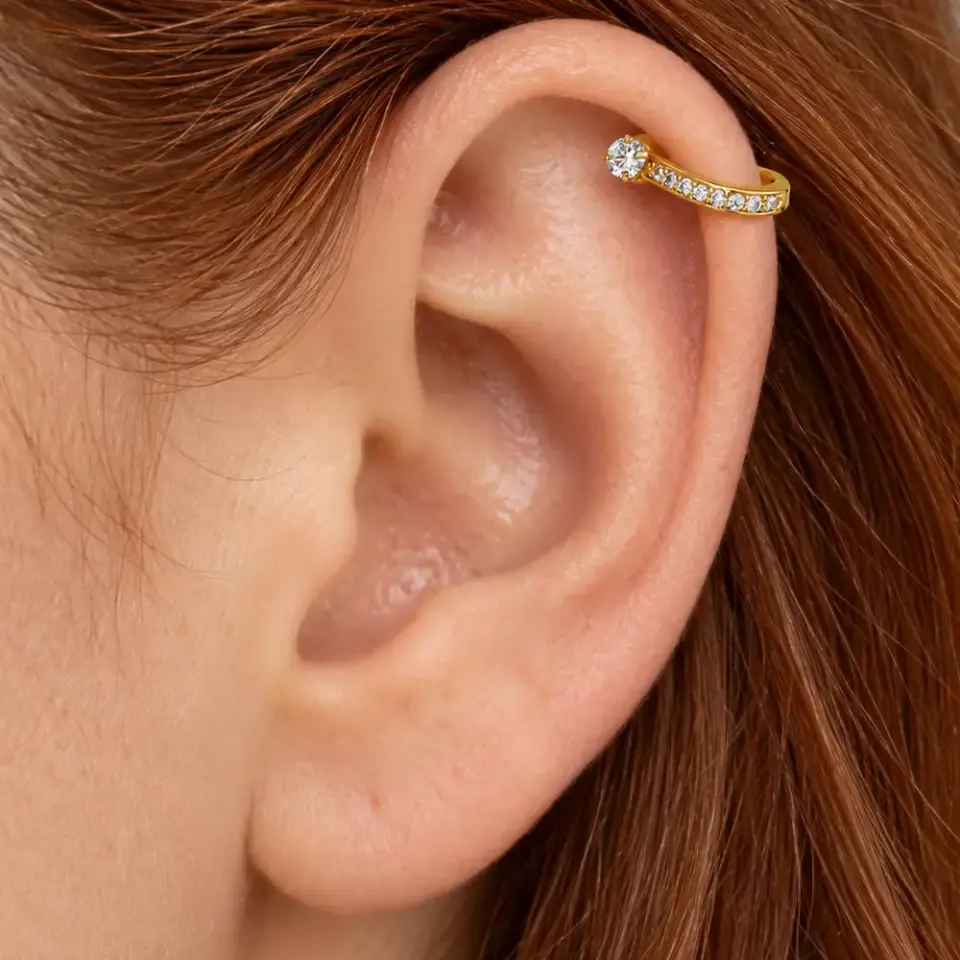 altin-rengi-sira-tas-helix-piercing