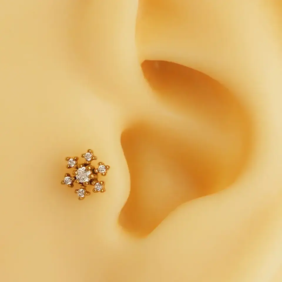 gold-zirkon-tasli-kar-tanesi-tragus-helix-kikirdak-piercing