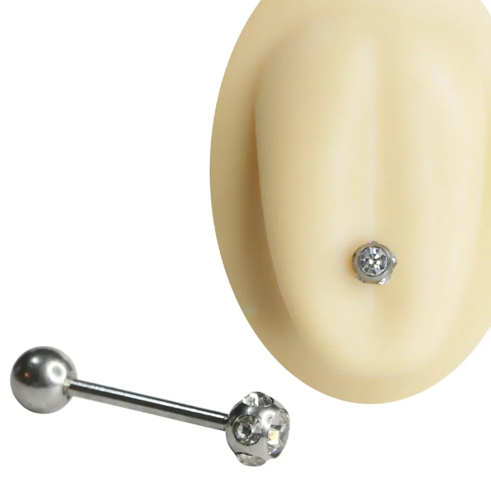 Gümüş renkli cerrahi çelikten üretilmiş, çevresi çoklu şeffaf zirkon taşlarla süslü yuvarlak top başlıklı dil piercingi ve 1,6 mm x 16 mm dil barının 