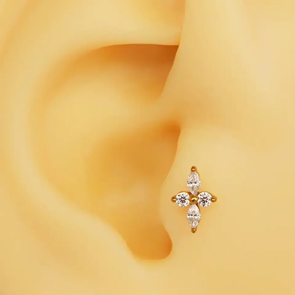 gold-zirkon-tasli-kuzey-yildizi-tragus-helix-kikirdak-piercing