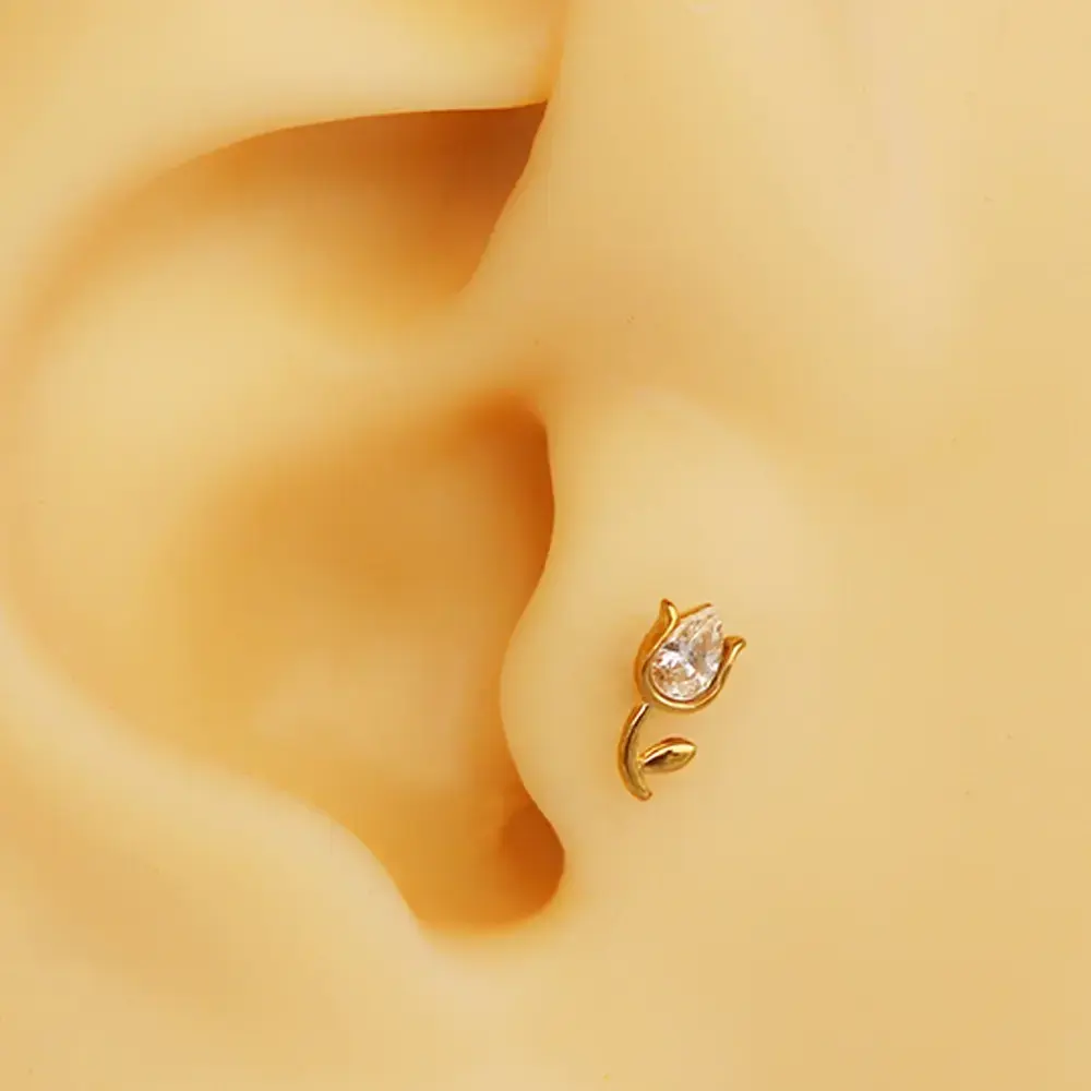 Altın renkli damla zirkon taşlı lale figürlü 316L cerrahi çelik tragus piercing