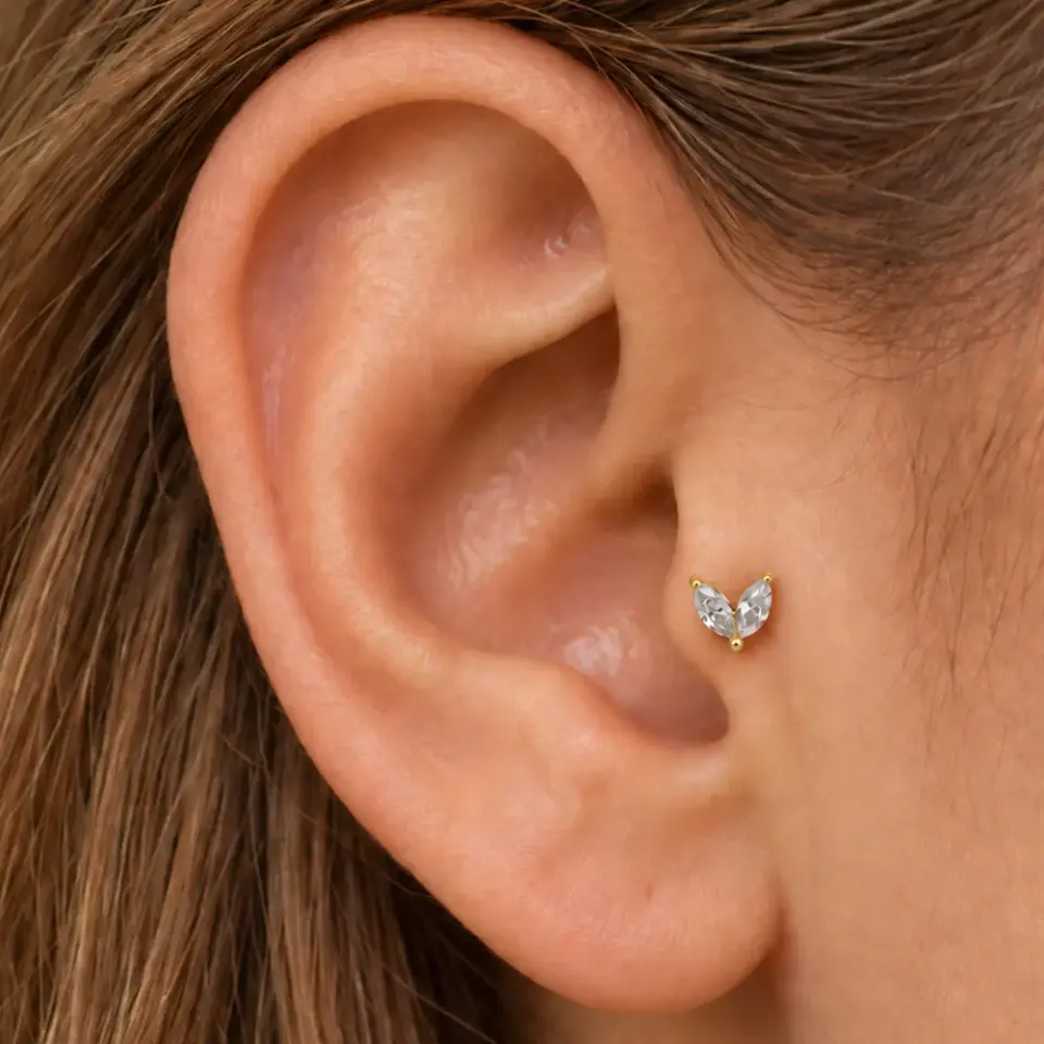 gold-iki-markiz-tragus-piercing