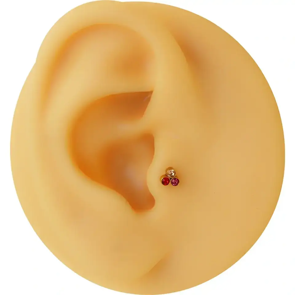 Arkası düz vidalı gold renkli taşlı helix conch piercing