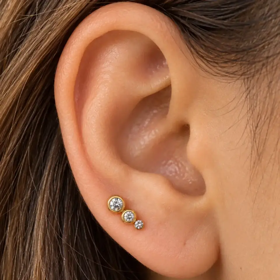 uc-zirkon-tasli-tragus-piercing-gold
