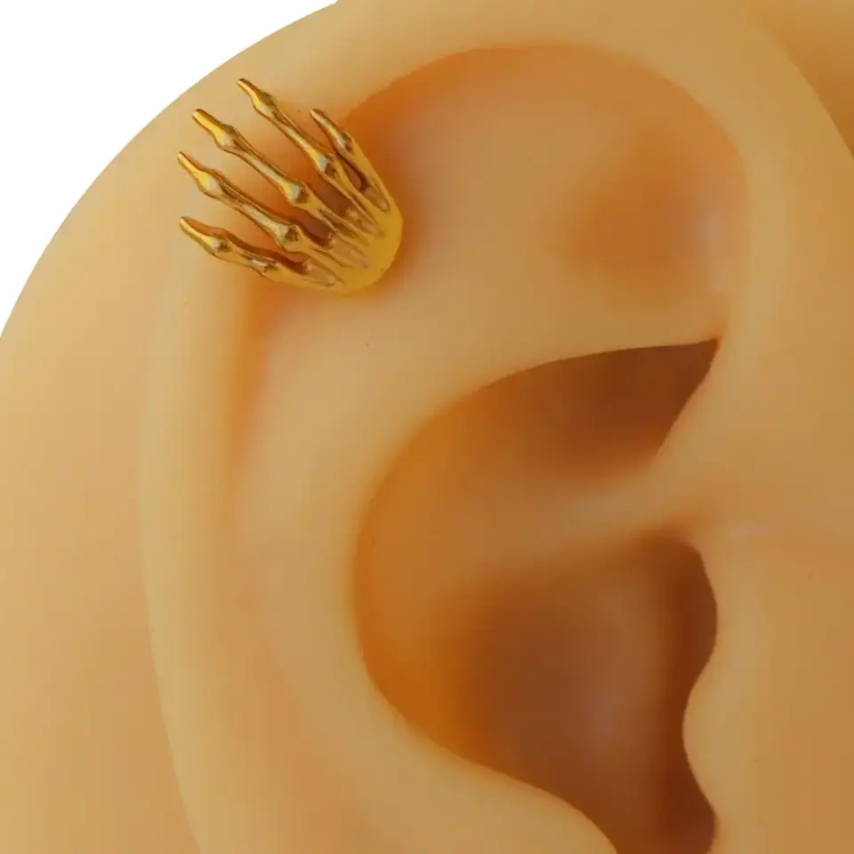 Altın renk iskelet eli figürlü 316L cerrahi çelik tragus piercing flatback