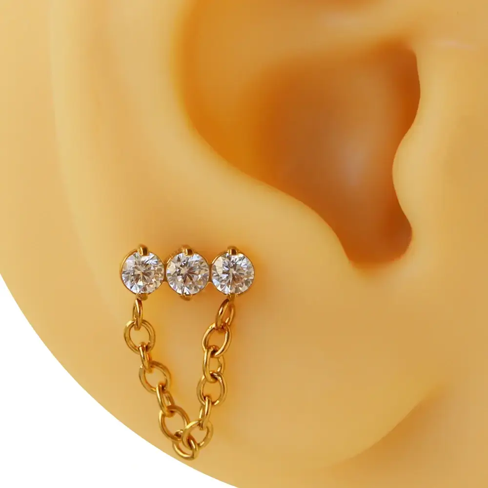 Sarı altın renk üçlü zirkon taşlı sallantılı zincir tasarım 316L cerrahi çelik tragus piercing flatback.