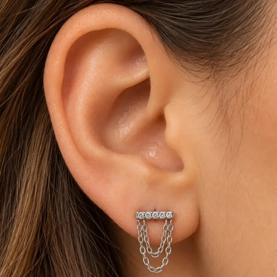 tasli-sallantili-gumus-helix-piercing