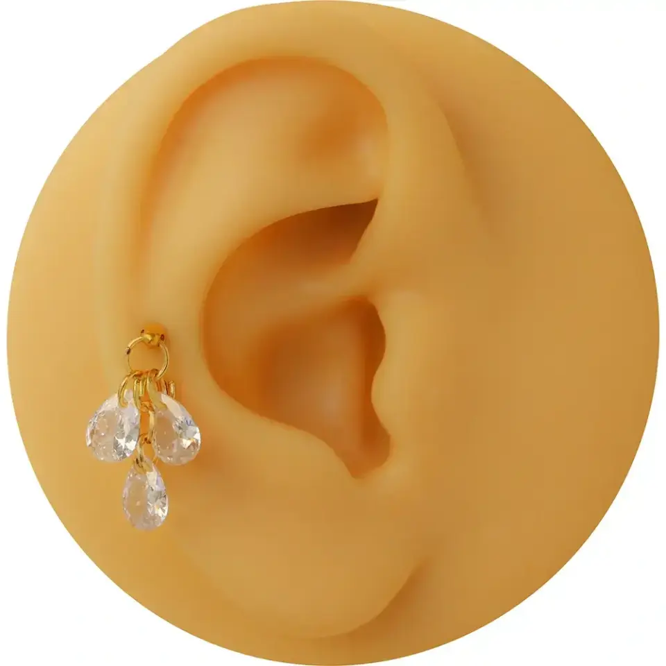 Şık ve kaliteli gold üç damla tragus helix kıkırdak piercing çeşitleri