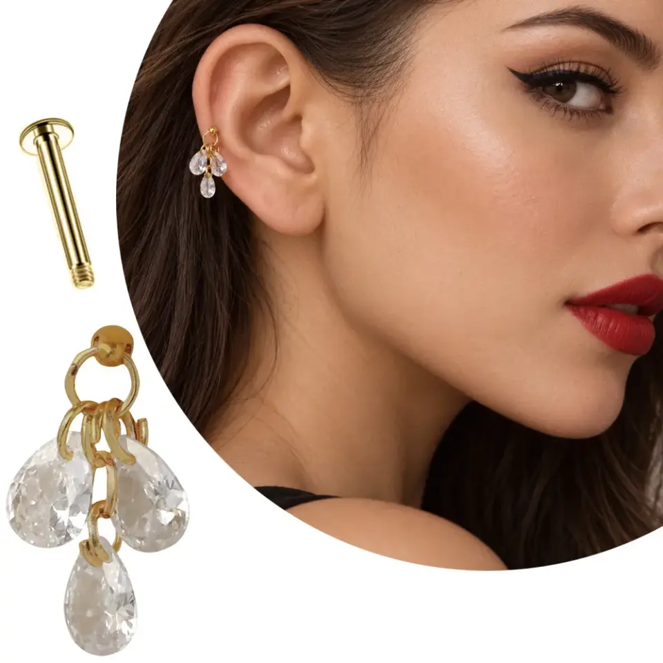 Gold renk üç damla zirkon taşlı tragus piercingin gerçek kulakta gösterimi