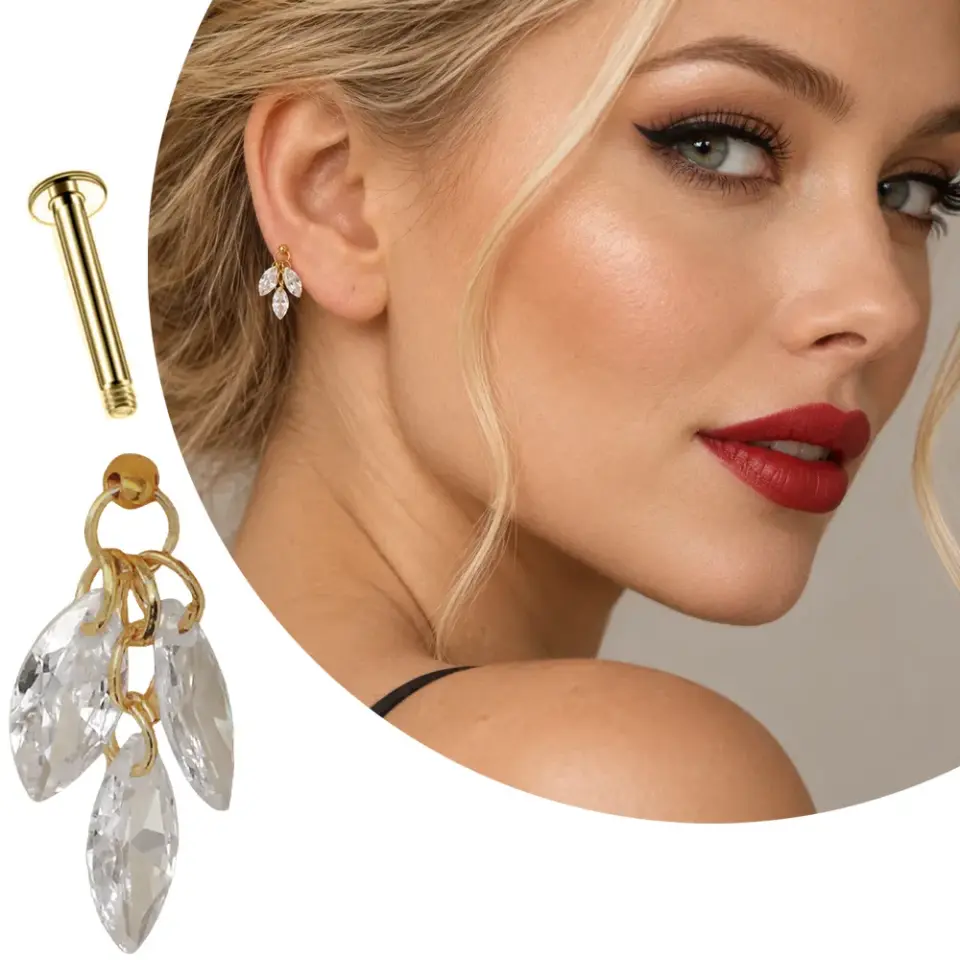 markiz Zirkon Taş Sallantılı Gold Çelik Tragus-Helix Piercingin gerçek kulakta gösterimi