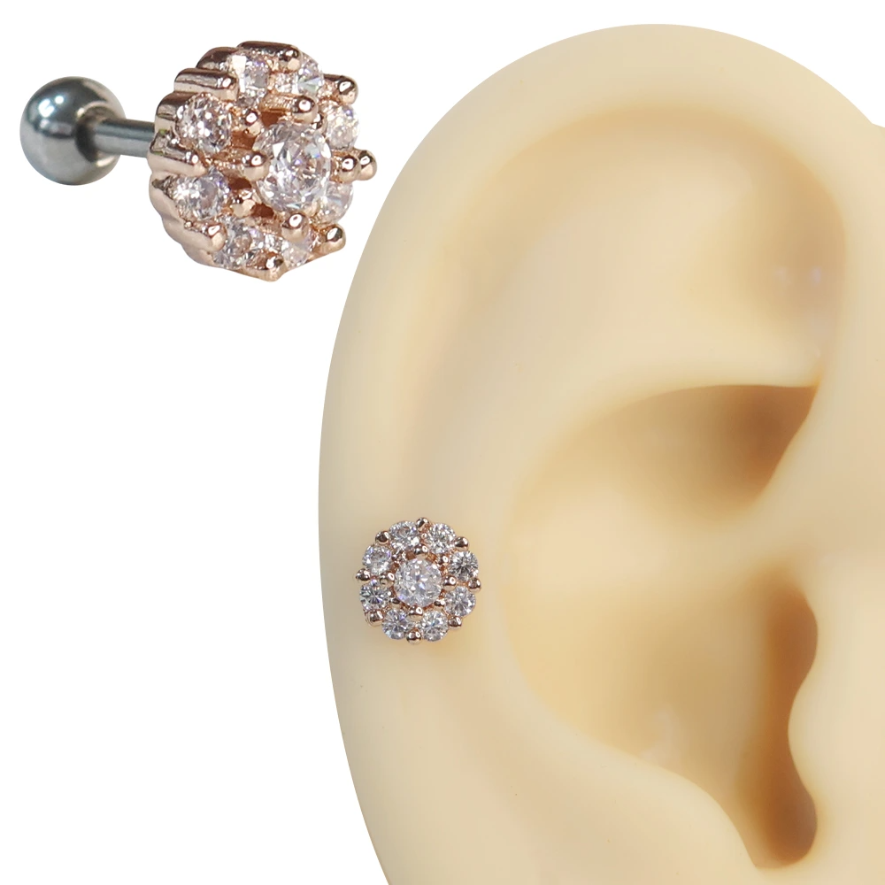 Kulak üzerinde sergilenen zirkon taşlı güneş tılsımı figürlü rose helix kıkırdak piercing