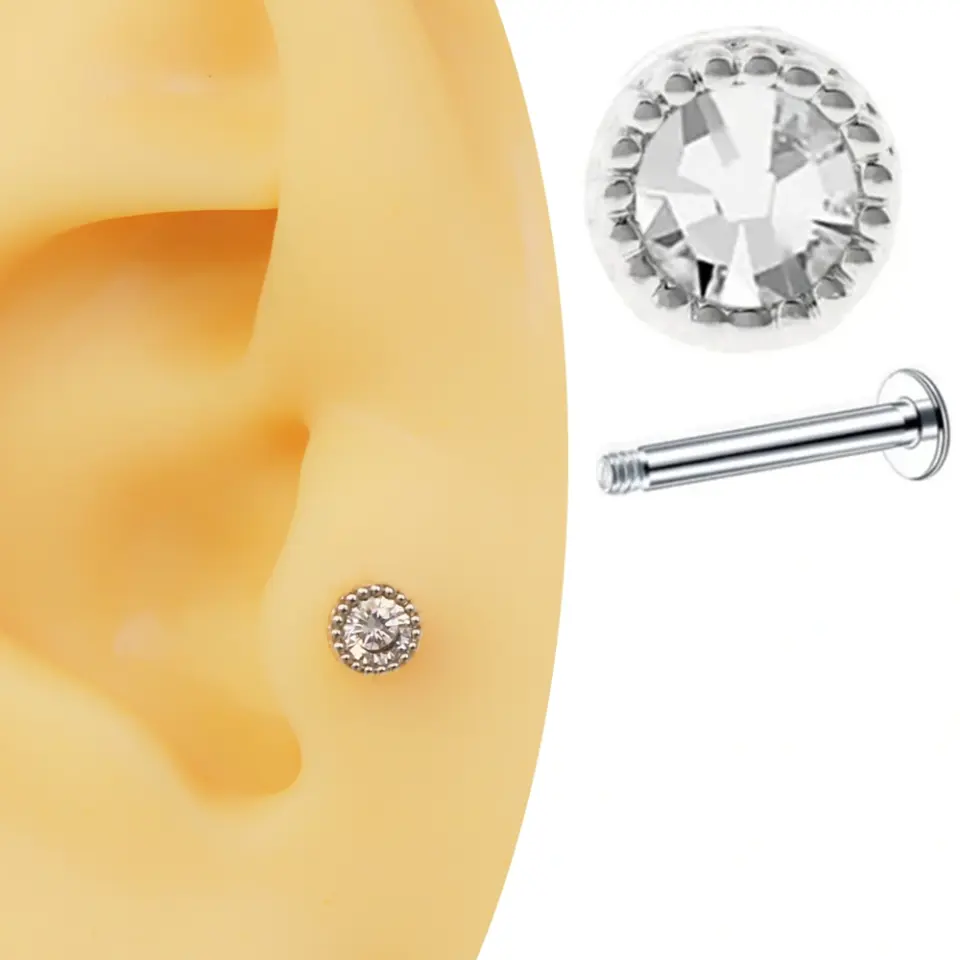 Gümüş renk zirkon taşlı ayın gözü figürlü tragus helix kıkırdak piercing kulak üzerinde duruşu