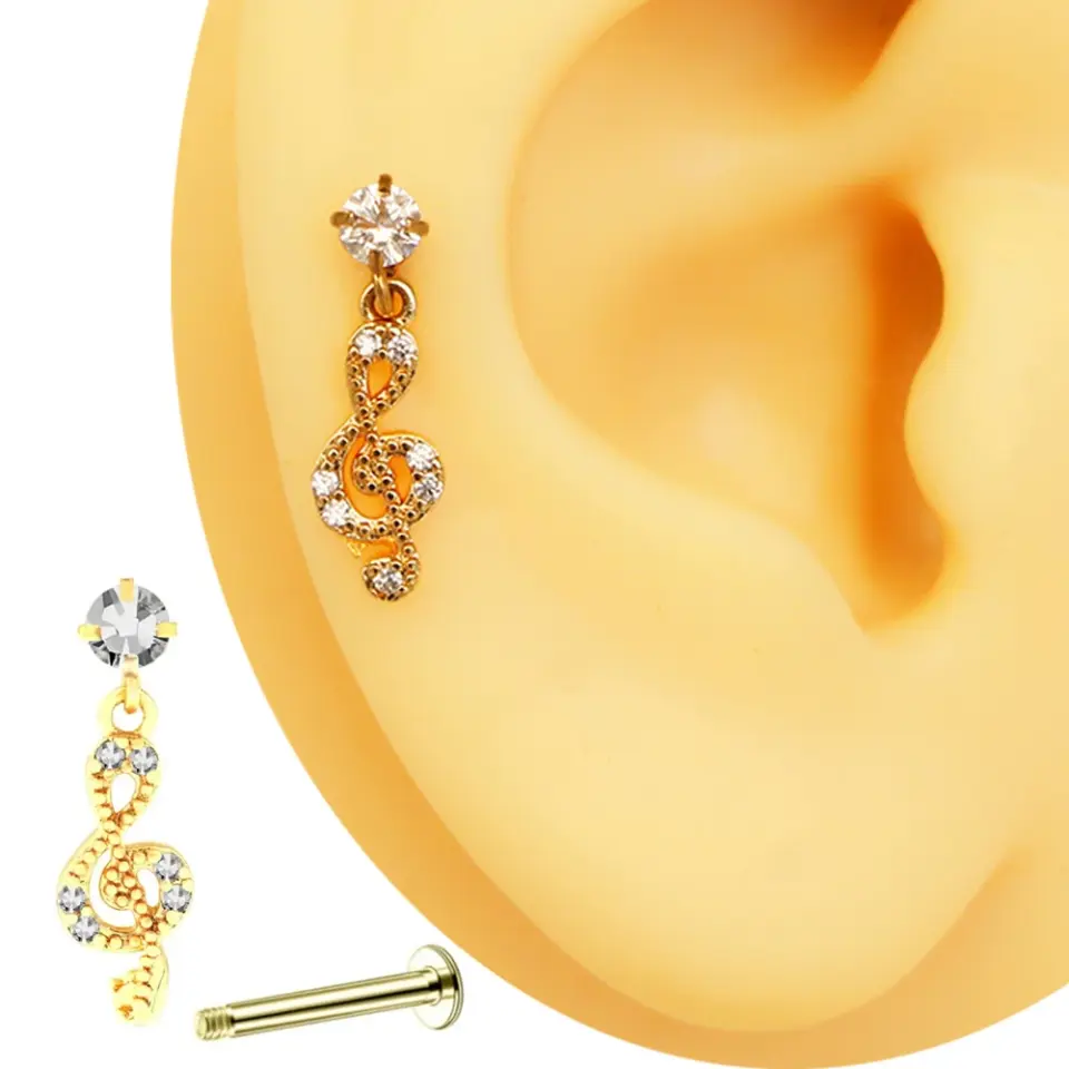 Altın rengi zirkon taşlı ruhun şarkısı figürlü tragus helix kıkırdak piercing kulak üzerinde duruşu
