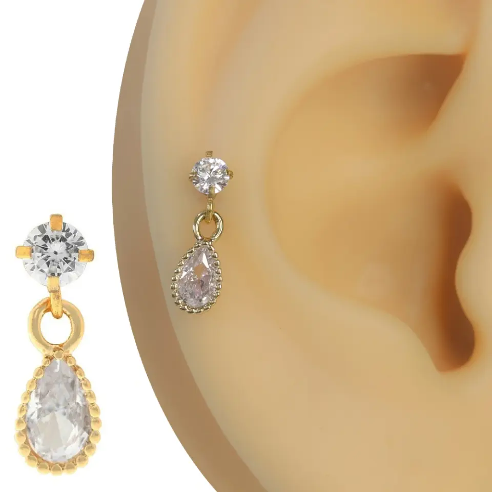 Altın rengi zirkon taşlı saf ışıltı figürlü tragus helix kıkırdak piercing kulak üzerinde duruşu