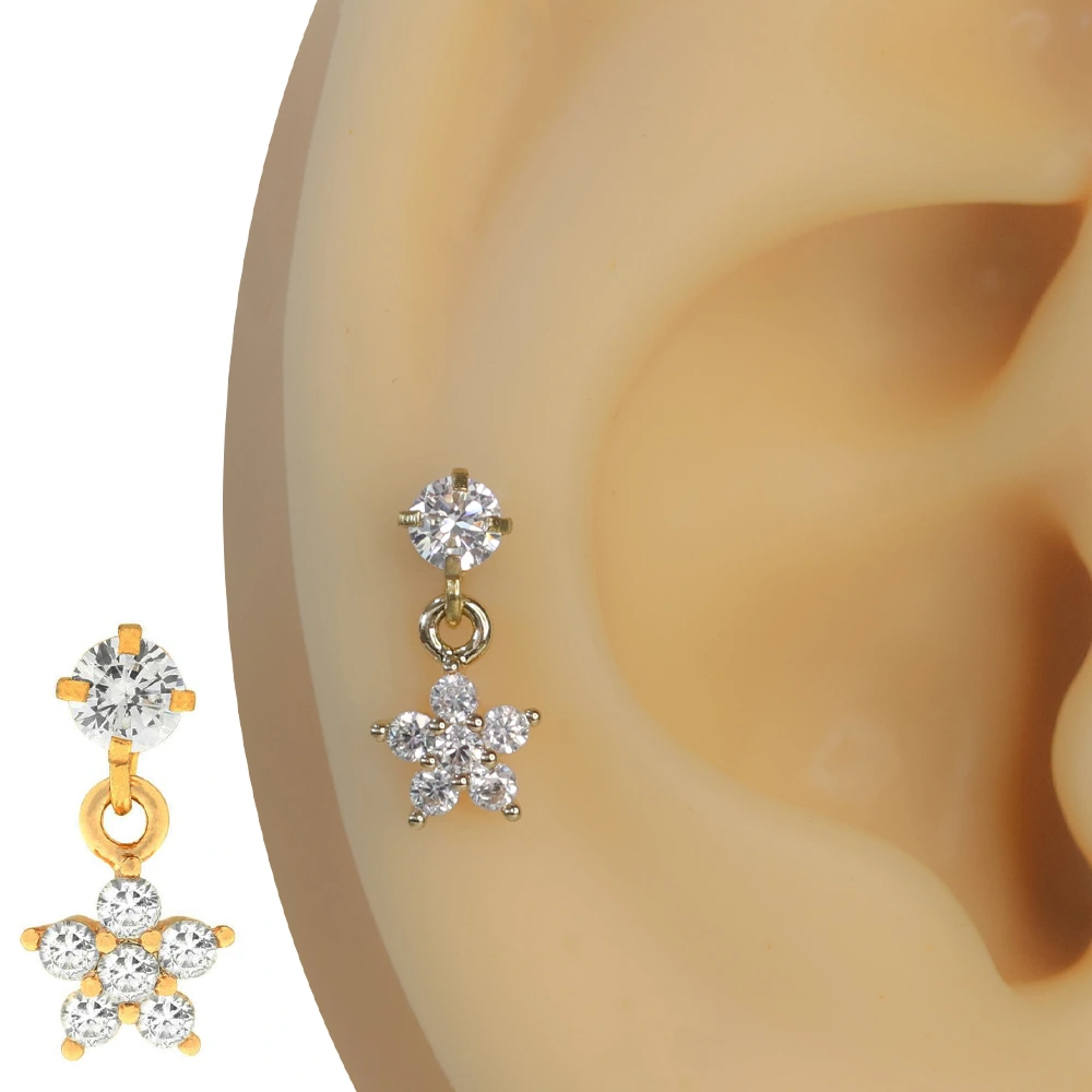 Altın rengi zirkon taşlı yıldız çiçeği figürlü tragus helix kıkırdak piercing kulak üzerinde duruşu