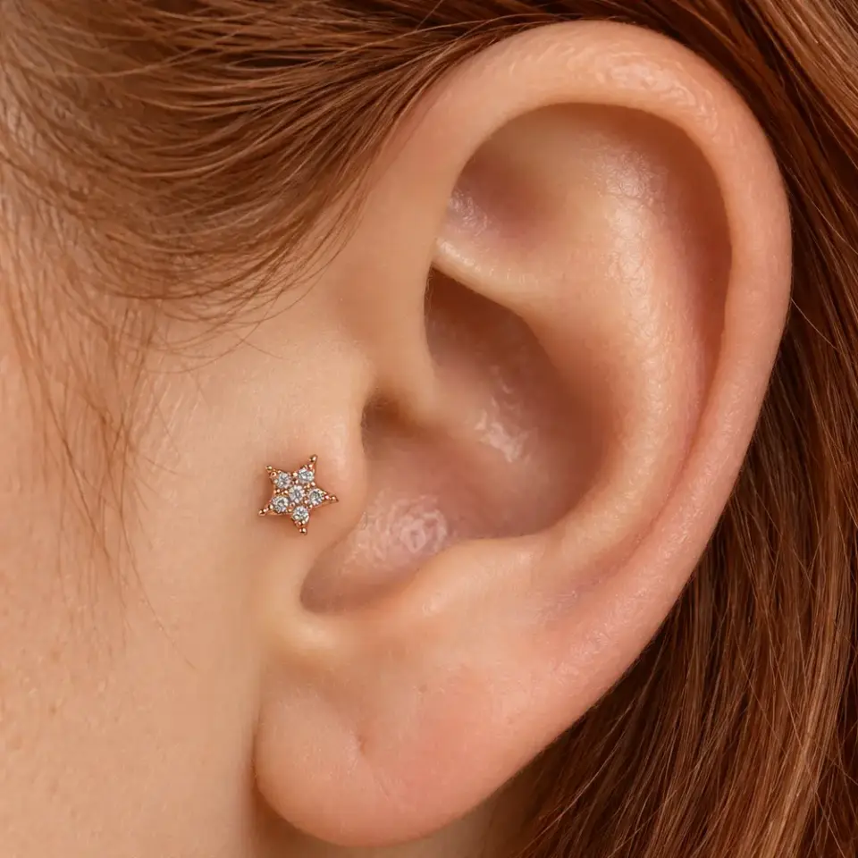 pembe-isilti-tragus-piercing