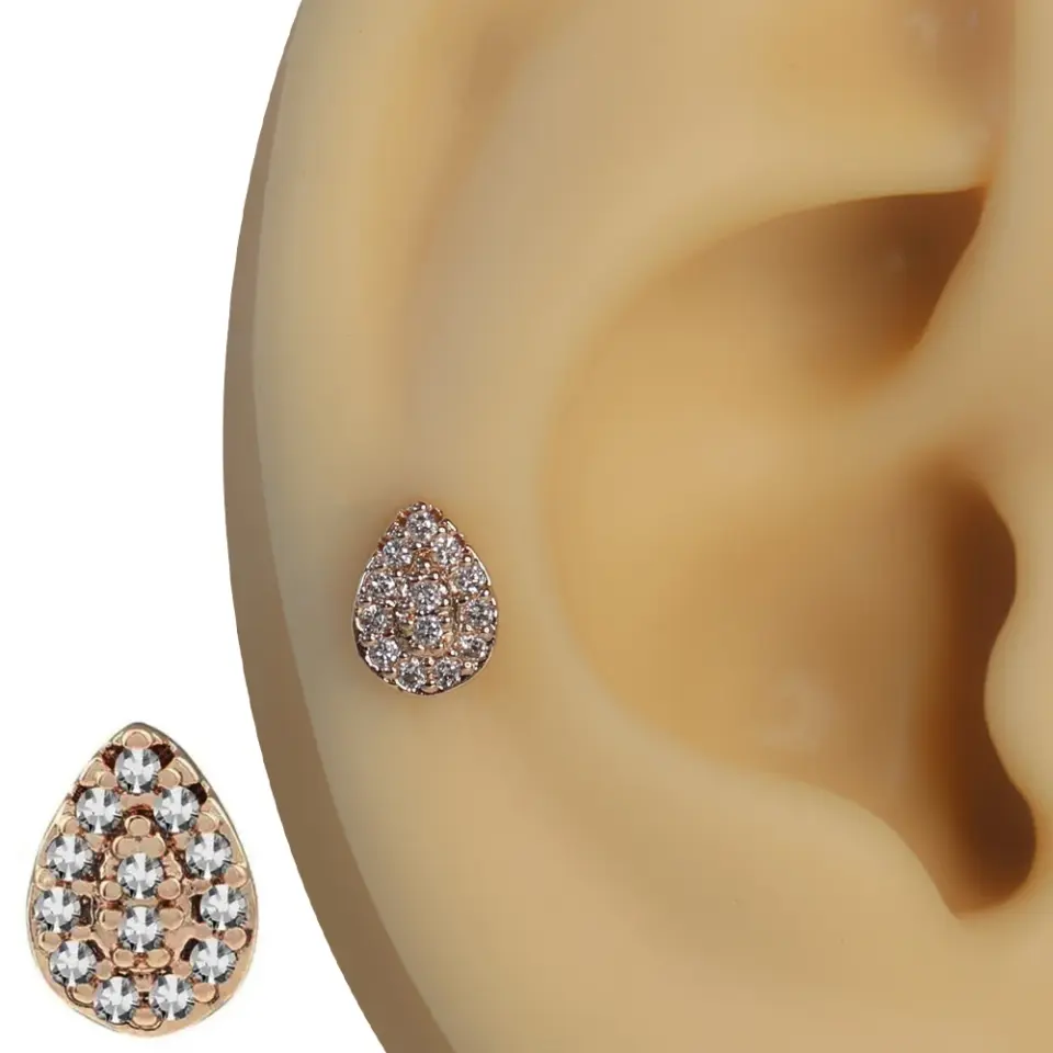 Rose gold pembe gözyaşı zirkon taşlı damla figürlü tragus helix kıkırdak piercing kulak üzerindeki zarif duruşu