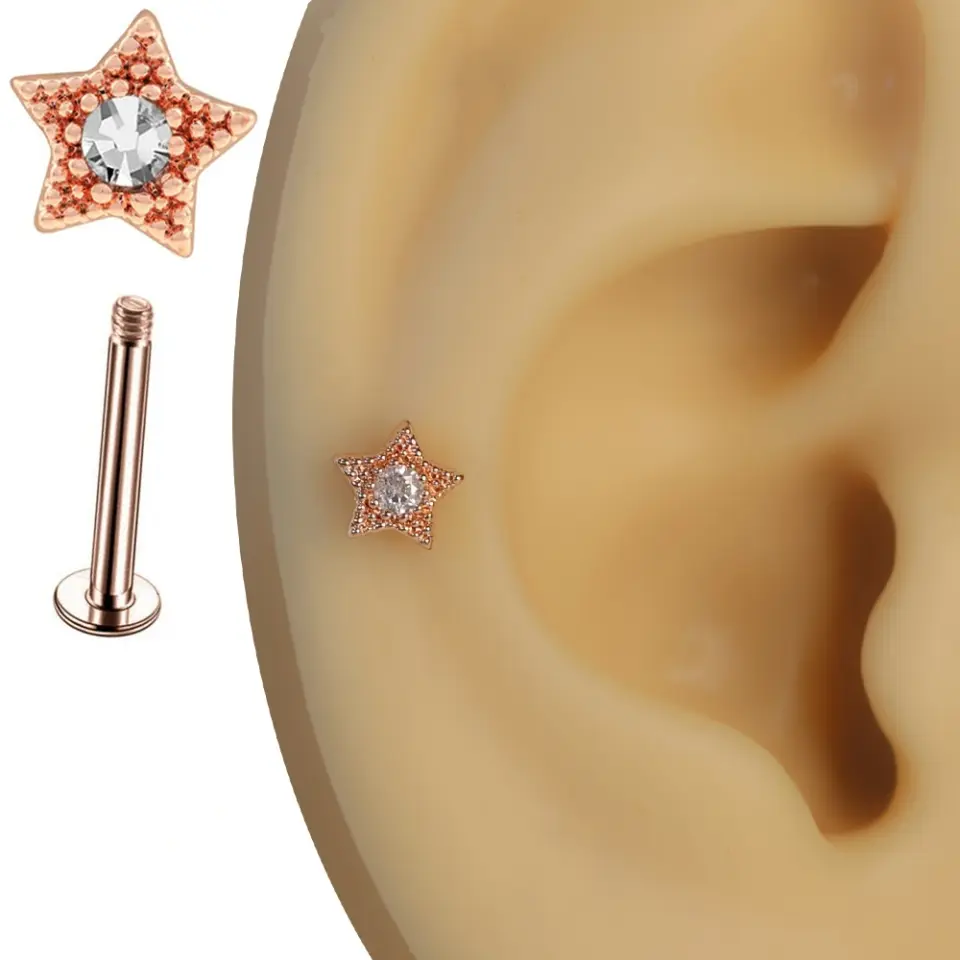 Rose gold pembe yıldız zirkon taşlı tragus helix kıkırdak piercing kulak üzerindeki zarif duruşu