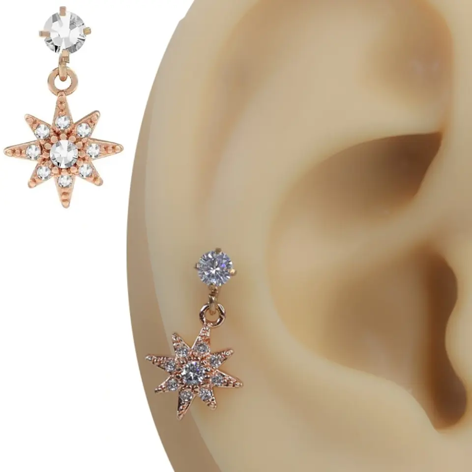 Rose gold ışıltı damlası zirkon taşlı damla figürlü tragus helix kıkırdak piercing kulak üzerindeki zarif duruşu