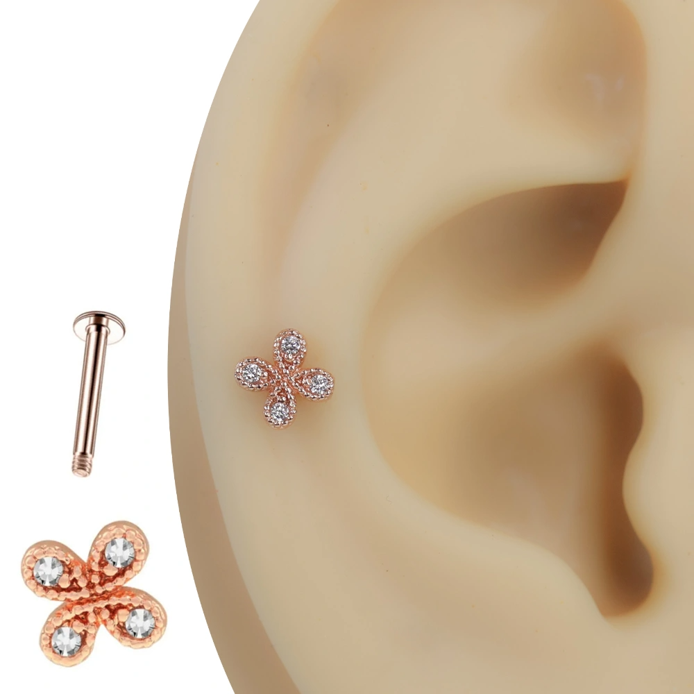 316L cerrahi çelik bar yapısına sahip kelebek model zirkon taşlı tragus helix kıkırdak piercing detay çekimi