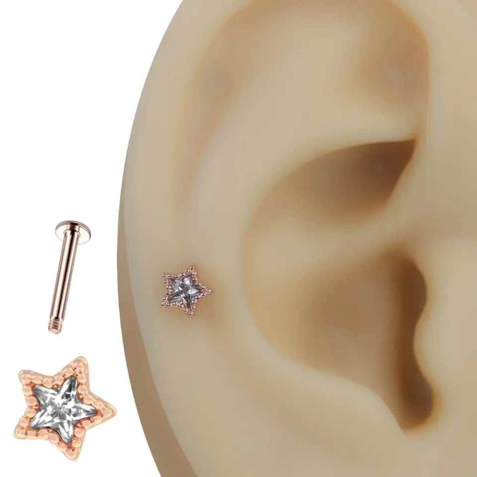 Rose gold göklerin ışığı yıldız zirkon taşlı tragus helix kıkırdak piercing kulak üzerindeki zarif duruşu