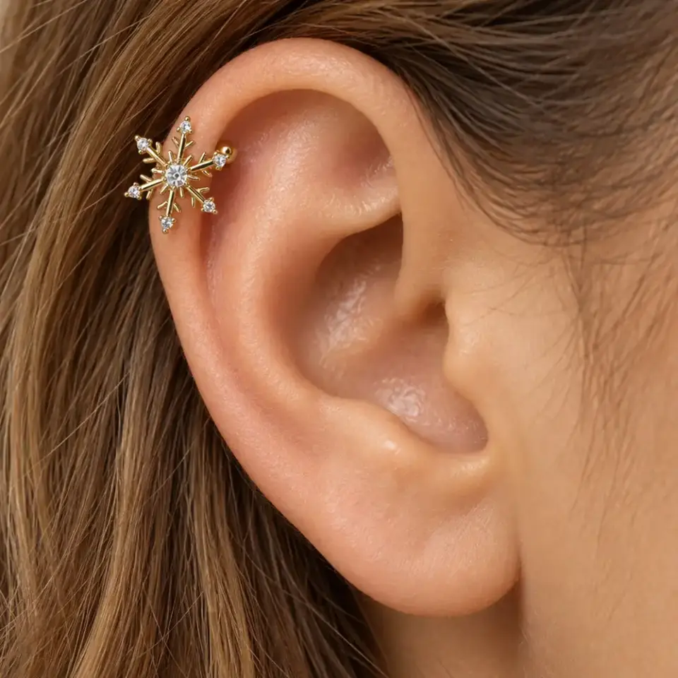 kıs-gunesi-gold-sikistirma-kikirdak-piercing-kulakta-durusu