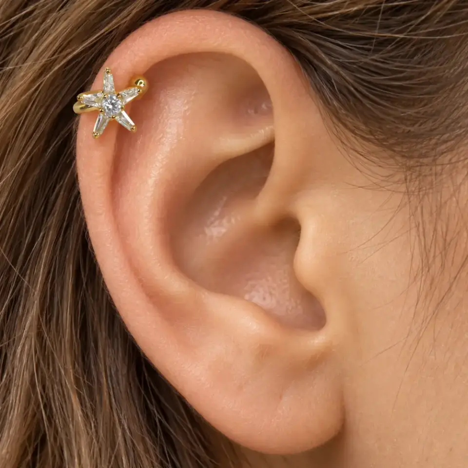 deniz-yildizi-gold-sikistirma-kikirdak-piercing-kulak-durusu