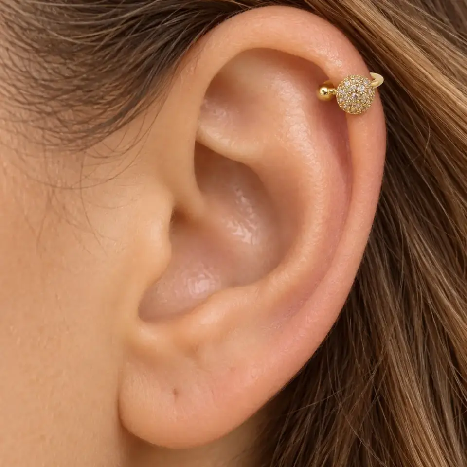 isik-kuresi-gold-sikistirma-kikirdak-piercing-kulak-durusu