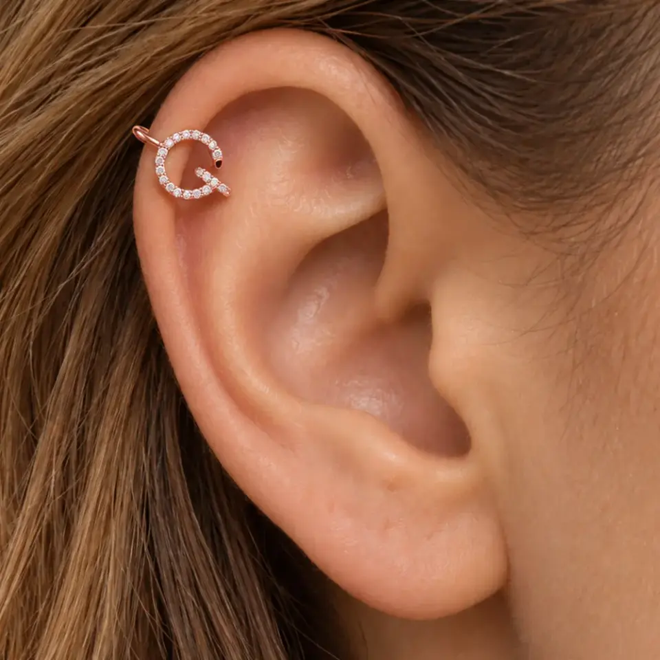 gizemli-muhur-rose-sikistirma-kikirdak-piercing-kulakta-durusu