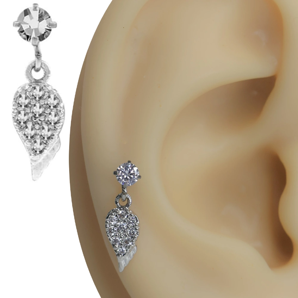 Kulak kıkırdak ve helix bölgesinde parlayan kanat figürlü zirkon taşlı piercing