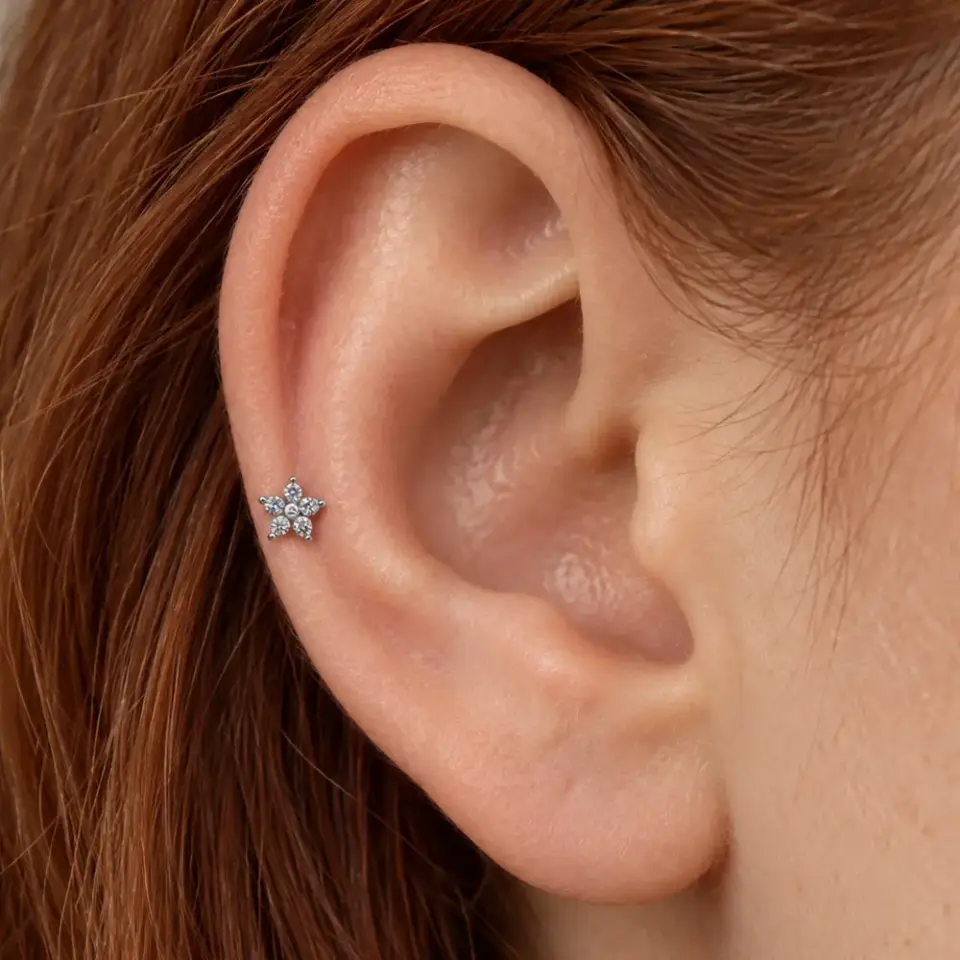 sans-cicegi-helix-piercing-kulak-durusu