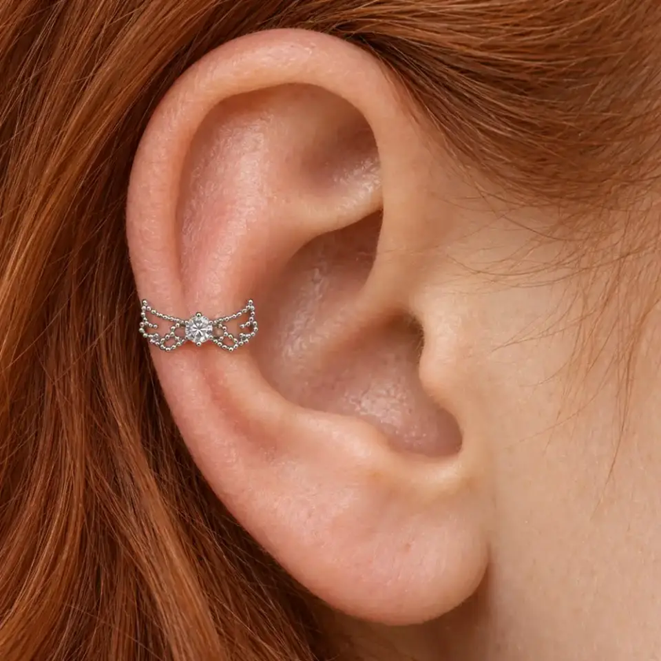 sonsuz-ucus-helix-piercing-kulak-durusu