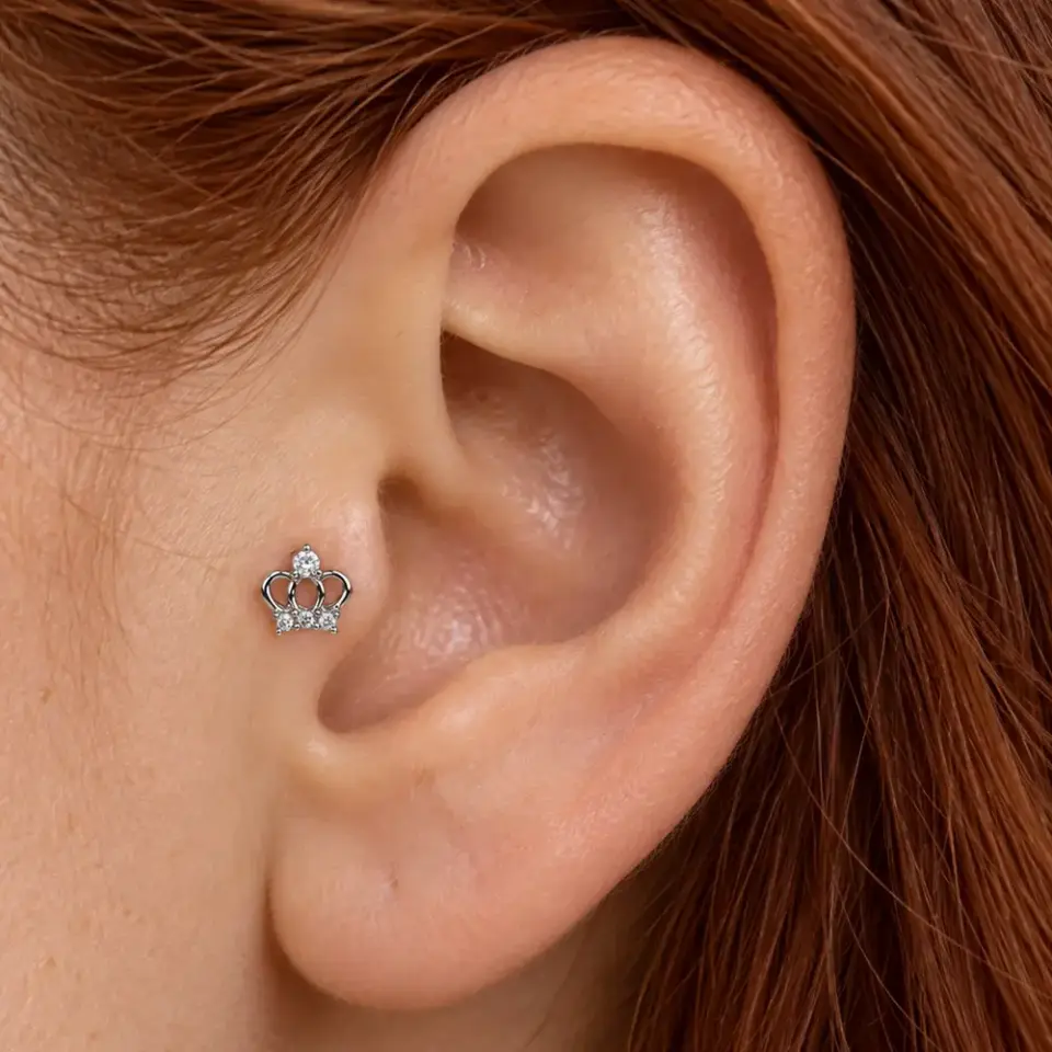 tac-tragus-piercing-kulak-durusu