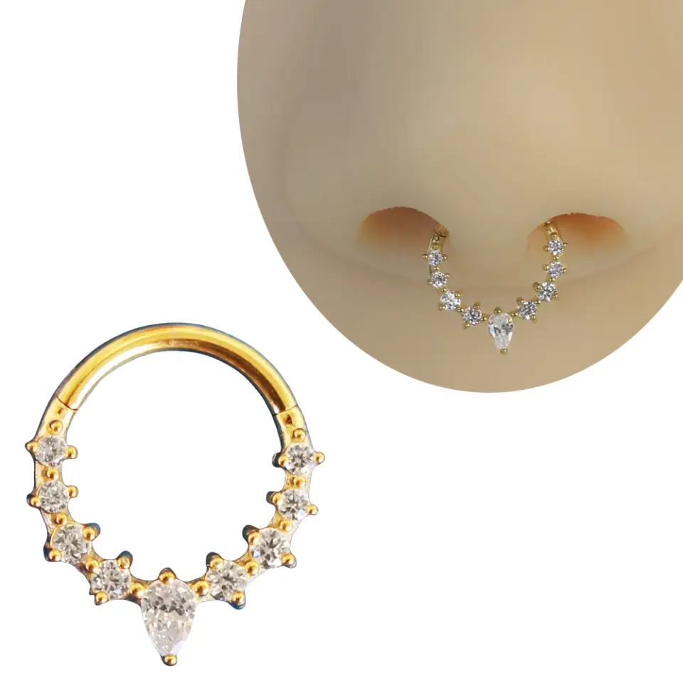 Septum ve daith bölgesinde sergilenen altın kararmayan damla halka septum kıkırdak piercing