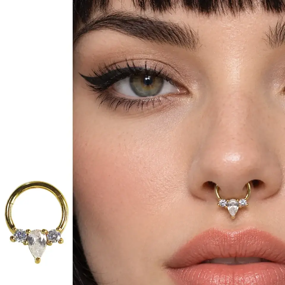 damla-tas-gold-septum-piercing