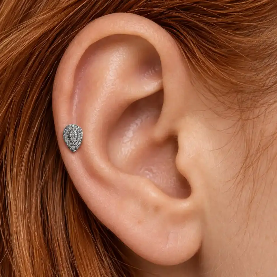 aura-tilsimi-helix-piercing-kulakta-durusu