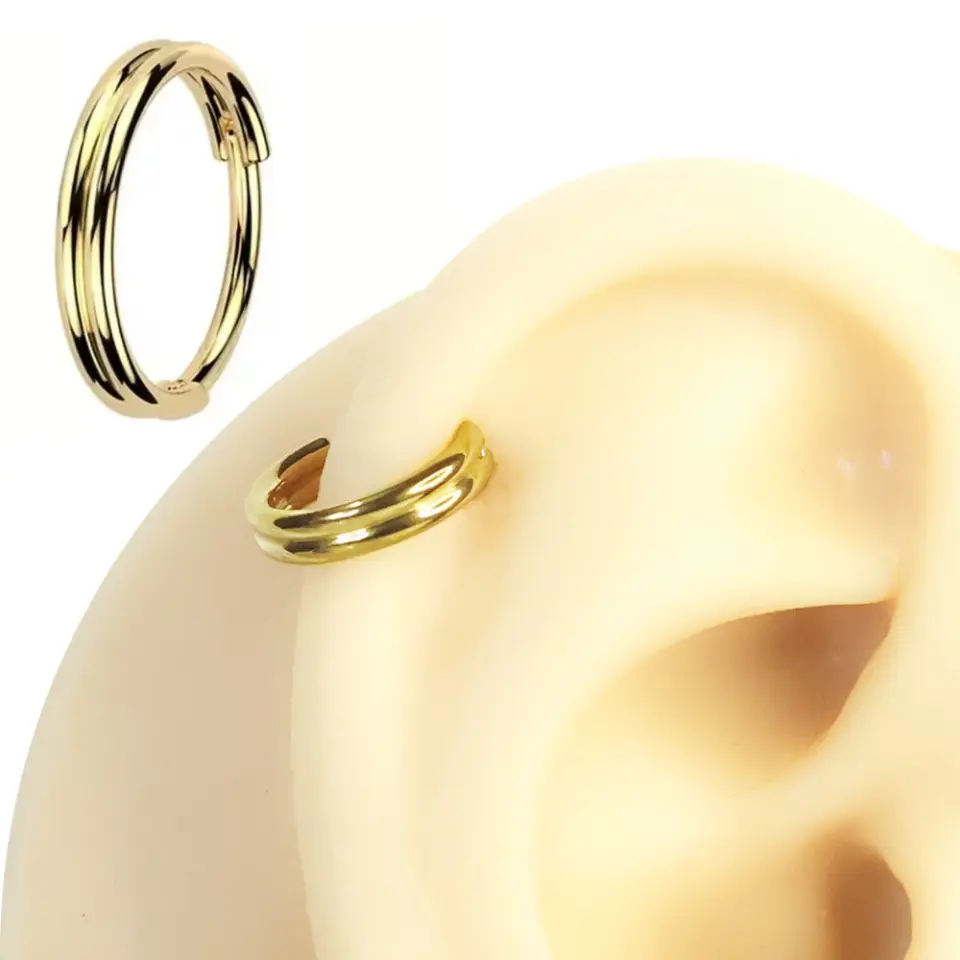 Septum ve daith bölgesinde sergilenen altın kararmayan halka septum kıkırdak piercing
