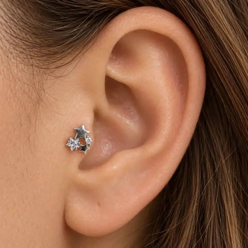 uc-dilek-yildizi-tragus-piercing-kulakta-durusu