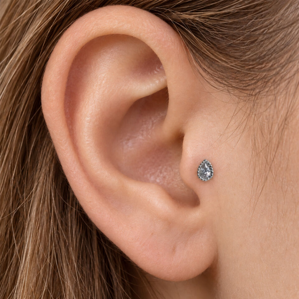 ruhun-damlasi-tragus-piercing