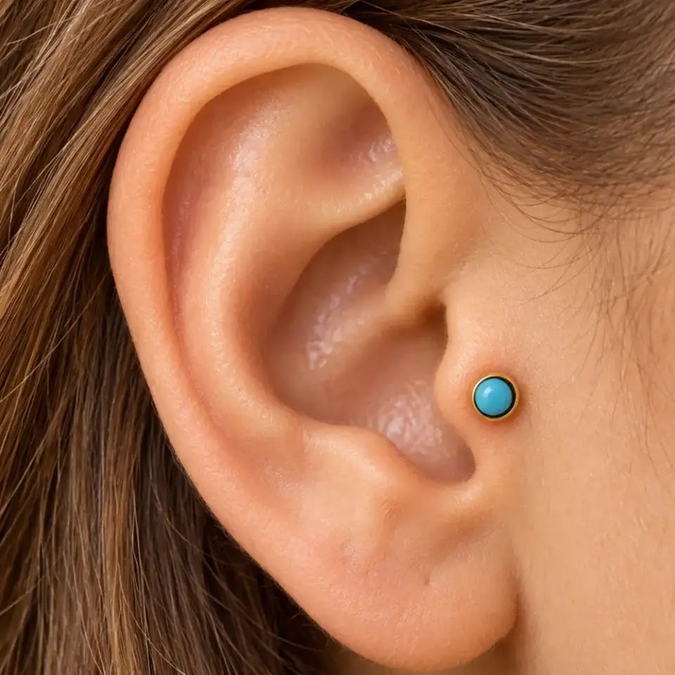 mavi-tasli-gold-tragus-piercing