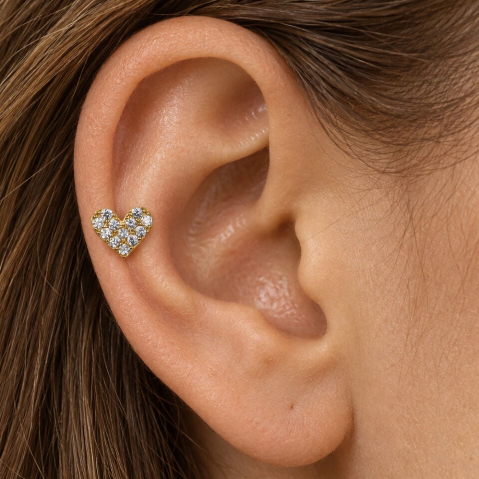 kalp-tragus-piercing-kulakta-durusu