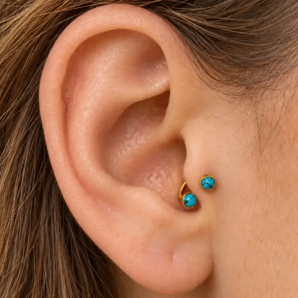 gold-turkuaz-tasli-halka-tragus-piercing