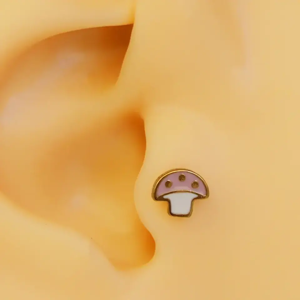 Altın renk mineli mantar figürlü 316L cerrahi çelik tragus piercing flatback