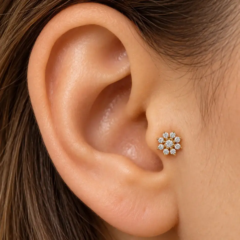 gold-papatya-tragus-piercing