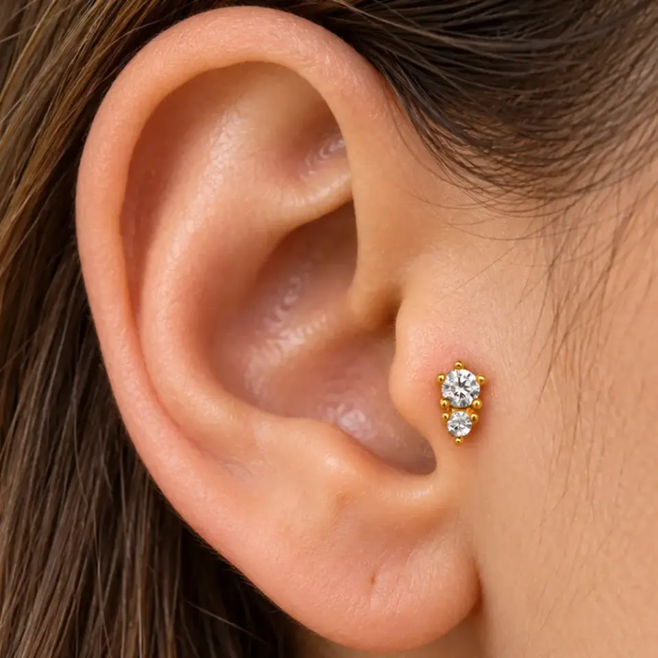 cift-tasli-gold-tragus-piercing