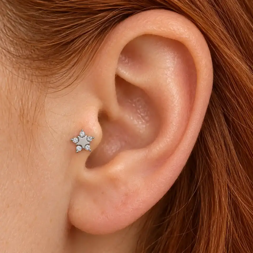 tasli-yildiz-tragus-piercing