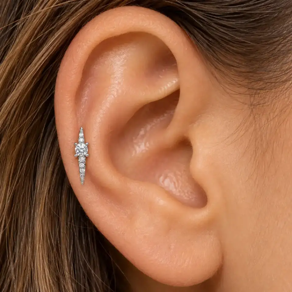 sarkit-tragus-piercing