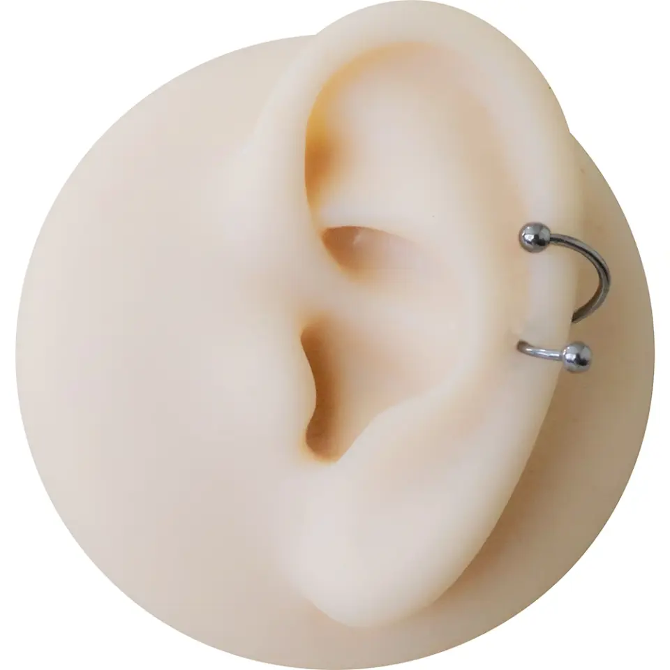Dudak ve tragus bölgesinde sergilenen gümüş kararmayan toplu spiral dudak kıkırdak halka piercing